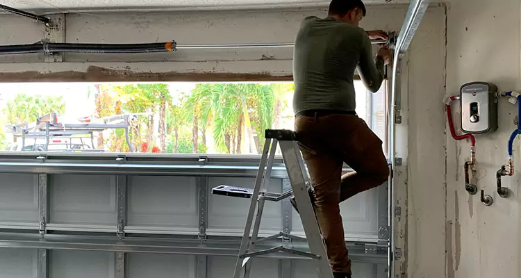 Garage Door Tension Spring Replacement in Palm River-Clair Mel, FL